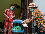 Modelo en Vietnam: ir al mercado por los demás en contexto pandémico