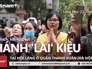 Procesión del palanquín de primavera maravilla a espectadores en Hanoi