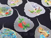 Cuadros bordados en hojas de bodhi