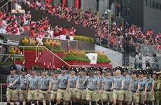 Premier vietnamita asiste a desfile por Día nacional de Singapur