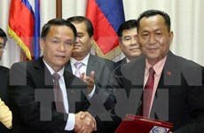 Agencias vietnamitas y laosianas de noticias fortalecen cooperación