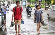 ¡Finalmente! Lluvia en Hanoi tras días de calor abrasador
