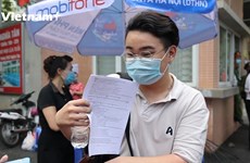 Alumnos vietnamitas terminan examen de graduación de bachillerato
