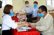 Evalúan en Vietnam políticas de apoyo a personas afectadas por la COVID-19