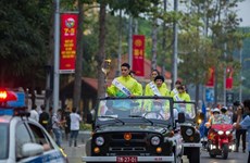 Relevo de antorcha de SEA Games 31 por las calles de Hanoi
