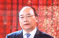 Premier vietnamita reitera favorecer actividades de empresas nacionales en Laos