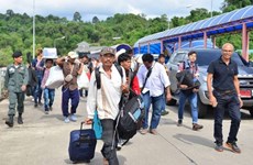 Decenas de miles de trabajadores extranjeros repatriados desde Tailandia  