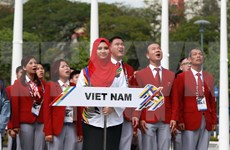 Izada bandera nacional de Vietnam en SEA Games 29 en Malasia