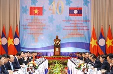 Premieres de Vietnam y Laos copresiden reunión 40 del Comité Intergubernamental