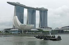 China y Singapur abogan por multilateralismo y libre comercio