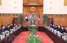 Premier laosiano resalta aportes del exsecretario generel del PCV, Do Muoi, a nexos bilaterales