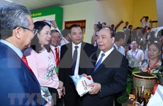 Premier participa en Feria de Promoción de Inversión en An Giang