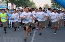 Nueve mil personas de 50 países y territorios corren en maratón en Ciudad Ho Chi Minh