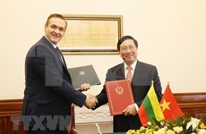 Firman Vietnam y Lituania acuerdo de exención del visado para diplomáticos