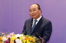 Premier vietnamita aboga por el desarrollo vigoroso de la economía nacional