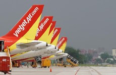 Supervisan salud de tripulación en vuelos de Vietjet Air a Wuhan 