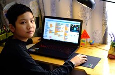 Diseña alumno vietnamita de primaria juegos en línea sobre el COVID-19
