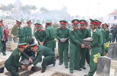 Sepultan restos de voluntarios vietnamitas caídos en Laos