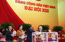 Felicita Laos a reelegido secretario general del Partido Comunista de Vietnam 
