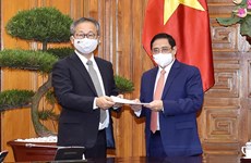 Premier vietnamita pide a Japón continuar cooperando en combate contra pandemia