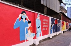 Lanzan en Hanoi proyecto de murales de propaganda sobre lucha contra COVID-19