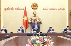 Debaten en Vietnam políticas específicas en lucha contra el COVID-19