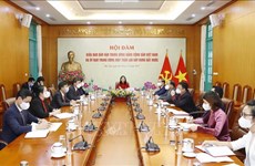 Debaten orientaciones para agilzar cooperación Vietnam- Laos en movilización de masas