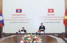Vietnam y Laos intercambian experiencias en labores parlamentarios 