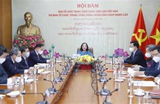 Fomentan cooperación entre comisiones partidistas de Vietnam y Laos