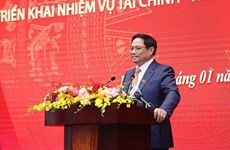 Premier vietnamita insta al sector financiero a garantizar principios de ahorro, integridad y rectitud