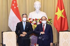 Visita del presidente vietnamita a Singapur favorece adopción de orientaciones para futuros lazos