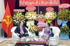 Dirigentes de Ho Chi Minh felicitan por la fiesta tradicional Bunpimay de Laos