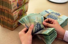 Instan a garantizar operaciones seguras del mercado financiero y monetario en Vietnam