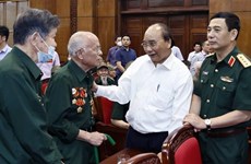 Presidente de Vietnam alaba méritos de mártires y excombatientes