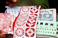 Papeles votivos, quintaesencia de la artesanía tradicional de los Nung Din