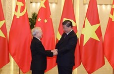 Efectúan en China acto de recibimiento al secretario general de PCV