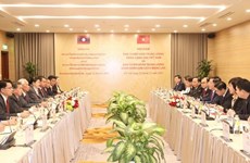 Robustecen cooperación entre Comisiones de Partidos de Vietnam y Laos