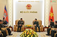 Ministro de Defensa de Vietnam recibe a secretario general de la Asociación de Veteranos de Guerra de Camboya