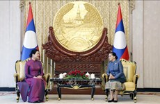 Uniones de Mujeres de Vietnam y Laos fortalecen cooperación bilateral