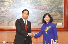 Vietnam y Laos intensifican intercambio de experiencias sobre movilización masiva