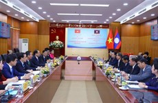 Vietnam y Laos comparten experiencias en gestión de asuntos religiosos