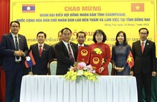 Provincias de Vietnam y Laos intercambian experiencias en actividades de consejos populares