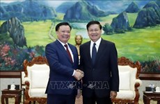 Presidente de Laos aprecia cooperación entre Hanoi y Vientiane