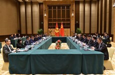Debaten orientaciones para agilizar lazos Vietnam- China en canal partidista