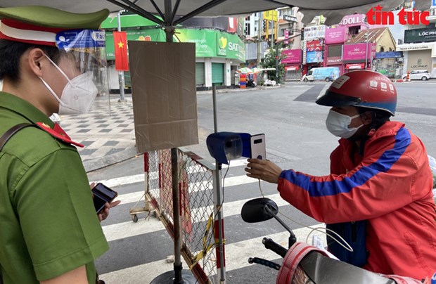 Ciudad Ho Chi Minh instala camaras de codigos QR para prevenir el COVID-19 hinh anh 1