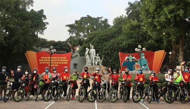 Hanoi brinda a turistas nuevo recorrido en bicicleta, a proposito de los SEA Games 31 hinh anh 1