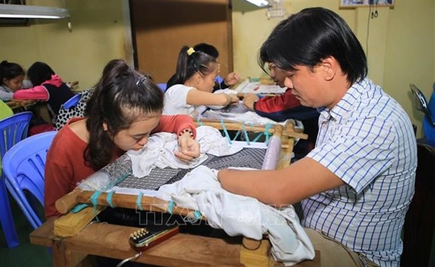 Vietnam se esfuerza por proteger derechos de personas con discapacidad hinh anh 1