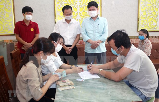 Vietnam refrenda politicas para reactivar el mercado laboral hinh anh 1