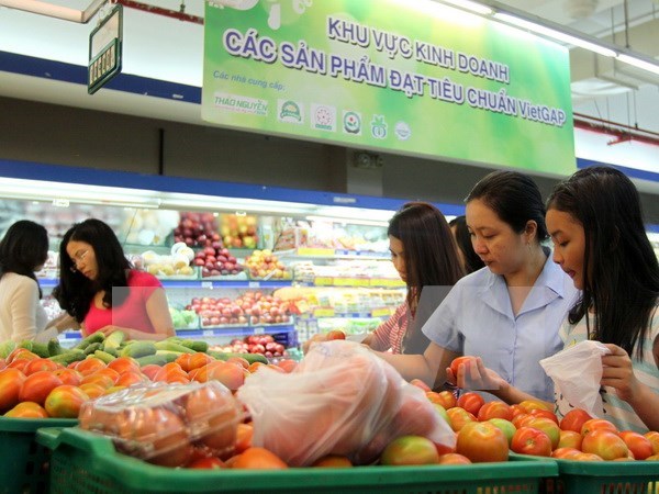 Merma confianza de consumidores vietnamitas en julio hinh anh 1