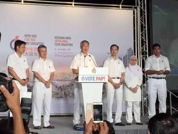 Singapur: Partido gobernante gana mayoria parlamentaria hinh anh 1